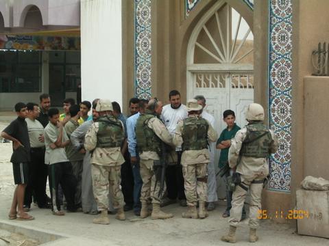 No guns and insurgents here.  We just don't want infidels in our Mosque